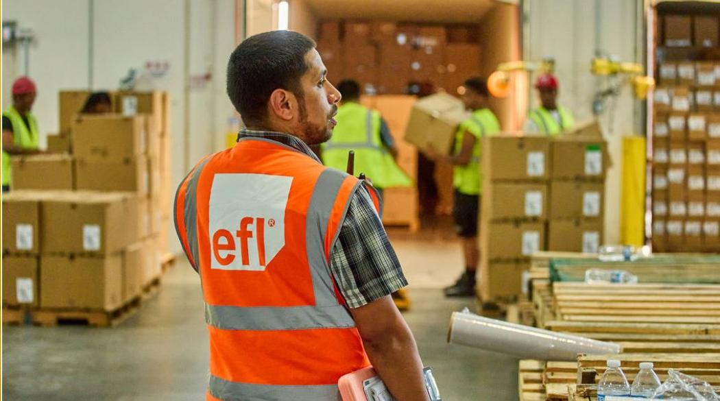 EFL male worker in warehouse