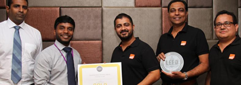 EFL staff holding award